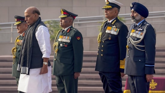 Defence Minister Rajnath Singh with Chief of Defence Staff General Anil Chauhan, Chief of Army Staff General Manoj Pande, Chief of Naval Staff Admiral R. Hari Kumar and Vice Chief of Air Staff Air Marshal Amar Preet Singh pays tribute at the National War Memorial on the occasion of Vijay Diwas in New Delh.(PTI)