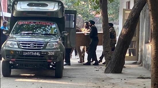 Senior army officials taking the body of lieutenant Akshat after post-mortem. (HT Photo)
