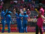 India's bowler Arshdeep Singh, centre, celebrates a wicket with teammates. India's bowler Arshdeep Singh, centre, celebrates a wicket with teammates.