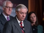 Sen. Lindsey Graham, R-S.C., flanked by Sen. John Cornyn, R-Texas, left, and Sen. Katie Britt, R-Ala., speaks to reporters as they criticize President Joe Biden's policies on the US-Mexico border, at the Capitol in Washington, Thursday, Dec. 7, 2023. Senate Republicans blocked the advance of tens of billions of dollars in military and economic assistance for Ukraine to broker a deal on Ukraine aid. (AP Photo/J. Scott Applewhite)
