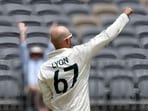 Australia's Nathan Lyon celebrates after taking the wicket of Pakistan's Imam-ul-Haq Australia's Nathan Lyon celebrates after taking the wicket of Pakistan's Imam-ul-Haq