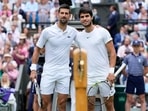 Serbia's Novak Djokovic, left, and Spain's Carlos Alcaraz pose for a photo. Serbia's Novak Djokovic, left, and Spain's Carlos Alcaraz pose for a photo.