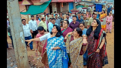 A five-member fact-finding team of BJP visits the incident site where a tribal woman was assaulted and paraded naked, in Belagavi on Saturday. (ANI) A five-member fact-finding team of BJP visits the incident site where a tribal woman was assaulted and paraded naked, in Belagavi on Saturday. (ANI)