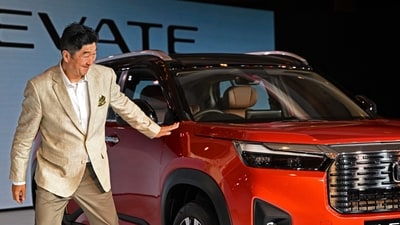 Takuya Tsumura, the President and Chief Executive Officer of Honda Cars India Ltd. gestures during the world premier launch of the new Honda Elevate SUV in New Delhi on June 6, 2023. (Photo by Arun SANKAR / AFP) Takuya Tsumura, the President and Chief Executive Officer of Honda Cars India Ltd. gestures during the world premier launch of the new Honda Elevate SUV in New Delhi on June 6, 2023. (Photo by Arun SANKAR / AFP)