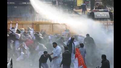Police using water cannons to disperse Punjab Youth Congress workers protesting outside the Punjab Congress Bhawan in Sector 15, Chandigarh, on Sunday. (Keshav Singh/HT) Police using water cannons to disperse Punjab Youth Congress workers protesting outside the Punjab Congress Bhawan in Sector 15, Chandigarh, on Sunday. (Keshav Singh/HT)