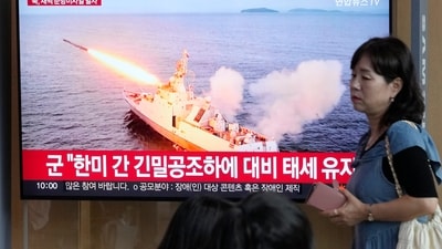 A TV screen shows a file image of North Korea's missile launch during a news program at the Seoul Railway Station in Seoul, South Korea. (AP)