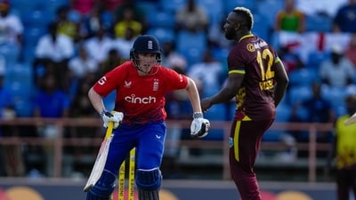 England's Harry Brook scores runs from the bowling of West Indies' Andre Russell during the third T20 cricket match at National Cricket Stadium (AP) England's Harry Brook scores runs from the bowling of West Indies' Andre Russell during the third T20 cricket match at National Cricket Stadium (AP)