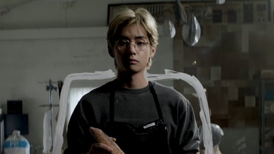 BTS member V in the new music video for his solo song Rainy Days.
