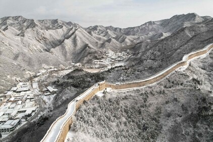 An aerial view of a snow-covered section of the Great Wall of China at Shuiguan, north of Beijing. (AFP)