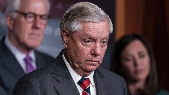 Sen. Lindsey Graham, R-S.C., flanked by Sen. John Cornyn, R-Texas, left, and Sen. Katie Britt, R-Ala., speaks to reporters as they criticize President Joe Biden's policies on the US-Mexico border, at the Capitol in Washington, Thursday, Dec. 7, 2023. Senate Republicans blocked the advance of tens of billions of dollars in military and economic assistance for Ukraine to broker a deal on Ukraine aid. (AP Photo/J. Scott Applewhite) (AP)