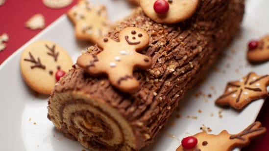 France - Bûche de Noël or Yule Log: "Bûche de Noël" is the French term for a Christmas cake shaped like a log. It consists of a sponge cake filled and covered with frosting, rolled to resemble a log. This delightful holiday classic holds a special place in French traditions and is commonly made during the Christmas season.&nbsp;(Unsplash)