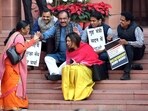 Suspended MPs stage a protest on the stairs of the Makar Dwar in the Parliament premises, in New Delhi. (ANI) Suspended MPs stage a protest on the stairs of the Makar Dwar in the Parliament premises, in New Delhi. (ANI)
