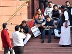Earlier today, suspended MPs staged a protest on the stairs of the Makar Dwar in the Parliament premises, in New Delhi on Monday. (ANI Photo/Rahul Singh) Earlier today, suspended MPs staged a protest on the stairs of the Makar Dwar in the Parliament premises, in New Delhi on Monday. (ANI Photo/Rahul Singh)