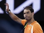 Rafael Nadal of Spain waves as he leaves Rod Laver Arena following his second round loss to Mackenzie McDonald of the U.S. at the Australian Open tennis championship in Melbourne, Australia