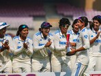 Navi Mumbai: Indian captain Harmanpreet Kaur carries the trophy after winning the one-off Test cricket match against England, at DY Patil Stadium, in Navi Mumbai, Saturday, Dec. 16, 2023. (PTI Photo/Kunal Patil)(PTI12_16_2023_000105B)(PTI)