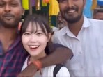 The image shows two men interrupting a Korean vlogger. The image shows two men interrupting a Korean vlogger.
