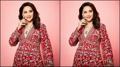 Assisted by hairstylist Sheetal Khan, Madhuri styled her lush locks into soft curls and left them open at the side, cascading beautifully down her shoulders to complement her look. (Instagram/@madhuridixitnene) Assisted by hairstylist Sheetal Khan, Madhuri styled her lush locks into soft curls and left them open at the side, cascading beautifully down her shoulders to complement her look. (Instagram/@madhuridixitnene)