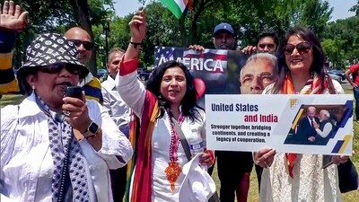 People from the Indian American diaspora pose for a picture as they hold a unity rally ahead of Prime Minister Narendra Modi's historic visit to the United States, in Washington on Monday. (ANI Photo)