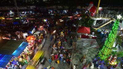 Decorative item shops in front of St Basilica church on the eve of Christmas festival in Bengaluru. (PTI) Decorative item shops in front of St Basilica church on the eve of Christmas festival in Bengaluru. (PTI)