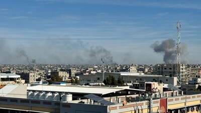 Smoke rises during Israeli strikes, amid the ongoing conflict between Israel and Palestinian Islamist group Hamas, in Khan Younis in the southern Gaza Strip, on December 16. (Reuters)