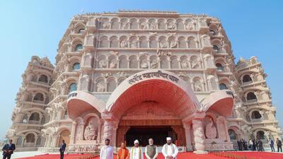 Prime Minister Narendra Modi along with Uttar Pradesh CM Yogi Adityanath and others visit the newly built Swarved Mahamandir, at Umaraha in Varanasi on Monday (ANI)