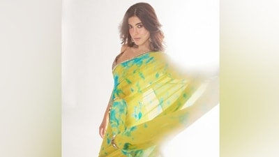 Shanaya's saree is from the shelves of the clothing label Akanksha Gajria. The chiffon saree comes in a pleasant yellow shade with a turquoise-blue tie-dye pattern. The border comes adorned with mirror embellishments, accentuating the look and making it party-ready. (Instagram) Shanaya's saree is from the shelves of the clothing label Akanksha Gajria. The chiffon saree comes in a pleasant yellow shade with a turquoise-blue tie-dye pattern. The border comes adorned with mirror embellishments, accentuating the look and making it party-ready. (Instagram)