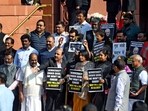 Suspended MPs including Dimple Yadav, Danish Ali and others stage a protest at the Makar Dwar following the suspension of 92 MPs for the remainder of the ongoing winter session of Parliament, in New Delhi on Tuesday.