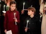 Britain's Princess Charlotte, left and Prince Louis attend the Royal Carols - Together At Christmas service, at Westminster Abbey, in London.