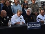 Gov. Greg Abbott signs three bills into law at a border wall construction site in Brownsville, Texas on Monday, Dec. 18, 2023, that will broaden his border security plans and add funding for more infrastructure to deter illegal immigration (AP Photo/Valerie Gonzalez) Gov. Greg Abbott signs three bills into law at a border wall construction site in Brownsville, Texas on Monday, Dec. 18, 2023, that will broaden his border security plans and add funding for more infrastructure to deter illegal immigration (AP Photo/Valerie Gonzalez)