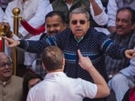 Suspended TMC MP Kalyan Banerjee mimicks presiding officers in an impromptu skit depicting the proceedings of the House during a protest at the Makar Dwar over the suspension of MPs amid the Winter session of Parliament on Tuesday, Suspended TMC MP Kalyan Banerjee mimicks presiding officers in an impromptu skit depicting the proceedings of the House during a protest at the Makar Dwar over the suspension of MPs amid the Winter session of Parliament on Tuesday,