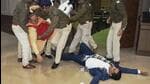 Jharkhand BJP MLAs Bhanu Pratap Sahi and Biranchi Narayan being removed by Assembly Marshals after their protest inside the House on Tuesday. (PTI)