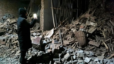 So far 32 aftershocks were recorded, with the largest registering a magnitude of 4.0, said Han Shujun, a spokesperson for the provincial emergency management department during a press conference, reported PTI. (AP) So far 32 aftershocks were recorded, with the largest registering a magnitude of 4.0, said Han Shujun, a spokesperson for the provincial emergency management department during a press conference, reported PTI. (AP)