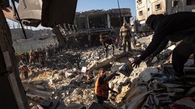 Israel-Hamas War: Palestinians search for bodies and survivors in the rubble of a residential building destroyed in an Israeli airstrike, in Rafah, southern Gaza Strip. (AP) Israel-Hamas War: Palestinians search for bodies and survivors in the rubble of a residential building destroyed in an Israeli airstrike, in Rafah, southern Gaza Strip. (AP)