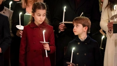 Britain's Princess Charlotte, left and Prince Louis attend the Royal Carols - Together At Christmas service, at Westminster Abbey, in London. (AP) Britain's Princess Charlotte, left and Prince Louis attend the Royal Carols - Together At Christmas service, at Westminster Abbey, in London. (AP)