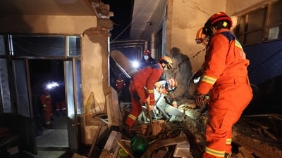 Rescue workers search a house for survivors after an earthquake in Kangdiao village, Dahejia, Jishishan County, in northwest China's Gansu province. (AFP) Rescue workers search a house for survivors after an earthquake in Kangdiao village, Dahejia, Jishishan County, in northwest China's Gansu province. (AFP)