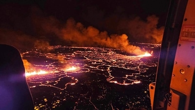 Billowing smoke and flowing lava turning the sky orange are seen in this Icelandic Department of Civil Protection and Emergency Management handout image during an volcanic eruption (AFP) Billowing smoke and flowing lava turning the sky orange are seen in this Icelandic Department of Civil Protection and Emergency Management handout image during an volcanic eruption (AFP)