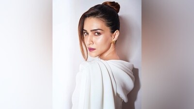 Celebrity stylist Sukriti Grover shared Kriti's pictures on Instagram. "@kritisanon is a vision in white [a dove emoji] for Outlook Business awards!" she captioned the post. The actor's ethereal white dress is from the shelves of Dazluq, and the accessories are from Jimmy Choo.&nbsp; (Instagram)