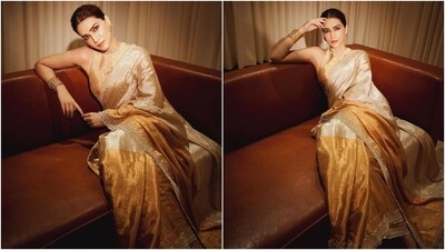 Earlier, Kriti had delighted her followers with another sartorial moment in a golden tissue silk saree embroidered with ombre gold patti borders and intricate kadhai. A matching halter-neck sleeveless blouse with gota patti work rounded off the look.&nbsp; (Instagram)