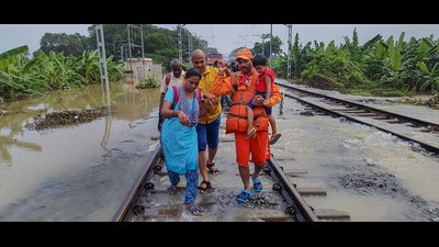NDRF personnel rescue passengers near Srivaikuntam railway station amid floods after heavy rainfall, in Thoothukudi district. (PTI) NDRF personnel rescue passengers near Srivaikuntam railway station amid floods after heavy rainfall, in Thoothukudi district. (PTI)
