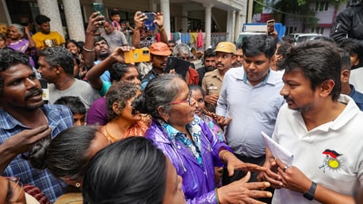 Tamil Nadu Youth Affairs and Sports Development Minister Udhayanidhi Stalin met flood affected people at a relief camp in Tirunelveli on Monday. (PTI) Tamil Nadu Youth Affairs and Sports Development Minister Udhayanidhi Stalin met flood affected people at a relief camp in Tirunelveli on Monday. (PTI)