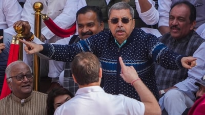 Suspended TMC MP Kalyan Banerjee mimicks presiding officers in an impromptu skit depicting the proceedings of the House during a protest at the Makar Dwar over the suspension of MPs amid the Winter session of Parliament on Tuesday, (PTI)