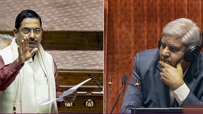 Rajya Sabha Chairman Jagdeep Dhankhar looks on as Union Minister Pralhad Joshi speaks in the House during the Winter session of Parliament. (PTI) Rajya Sabha Chairman Jagdeep Dhankhar looks on as Union Minister Pralhad Joshi speaks in the House during the Winter session of Parliament. (PTI)