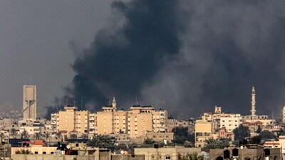 A picture taken from Rafah shows smoke billowing over Khan Yunis in the southern Gaza Strip during Israeli bombardment (AFP) A picture taken from Rafah shows smoke billowing over Khan Yunis in the southern Gaza Strip during Israeli bombardment (AFP)