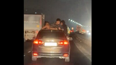 The image shows a group of men dancing in a moving car. (Screengrab) The image shows a group of men dancing in a moving car. (Screengrab)
