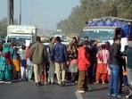Local residents blocked traffic on GT Karnal Road while protesting against the crime. (HT Photo) Local residents blocked traffic on GT Karnal Road while protesting against the crime. (HT Photo)