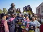 Suspended MPs during their protest in the Winter session of Parliament, in New Delhi, Tuesday, Dec. 19, 2023.