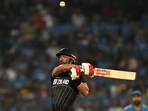 Daryl Mitchell plays a shot during the 2023 ICC Men's Cricket World Cup one-day international (ODI) first semi-final match between India and New Zealand Daryl Mitchell plays a shot during the 2023 ICC Men's Cricket World Cup one-day international (ODI) first semi-final match between India and New Zealand