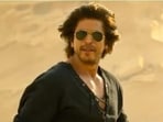 Shah Rukh Khan in a still from Dunki (L), Prabhas in Salaar. Shah Rukh Khan in a still from Dunki (L), Prabhas in Salaar.