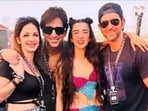 Hrithik Roshan (right) posing with Sussanne Khan, Arslan Goni and Saba Azad at an event. 