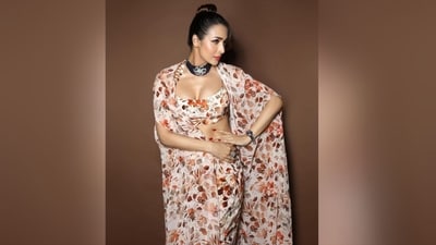 With the help of make-up artist Meghna Butani, Malaika wore nude eyeshadow, mascaraed lashes, winged eyeliner, blushed cheeks, luminous highlighter and a shade of glossy pink lipstick for her makeup look. (Instagram/@aasthasharma) With the help of make-up artist Meghna Butani, Malaika wore nude eyeshadow, mascaraed lashes, winged eyeliner, blushed cheeks, luminous highlighter and a shade of glossy pink lipstick for her makeup look. (Instagram/@aasthasharma)